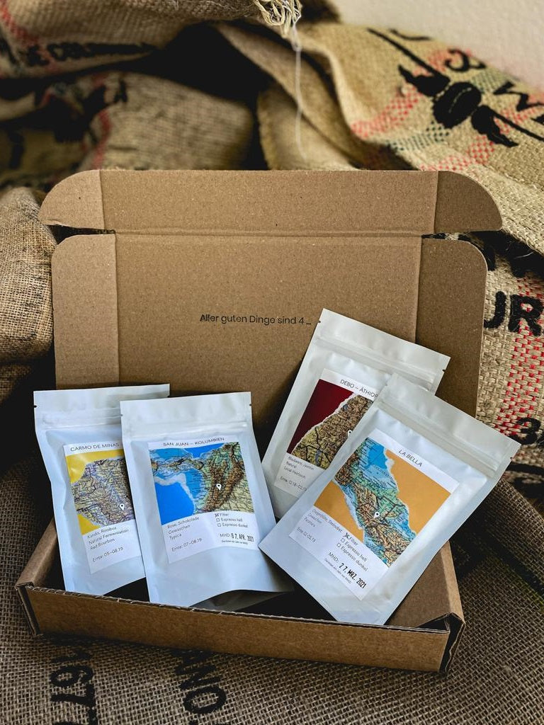 Kaffee Probierpaket geöffnet mit Inhalt